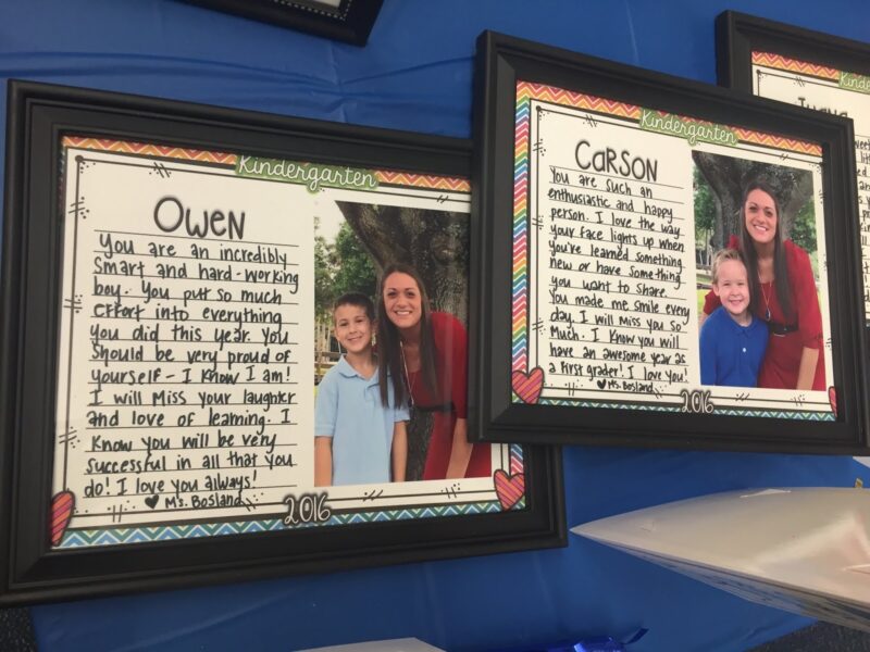 Framed kindergarten graduation letter with photo of student and teacher.