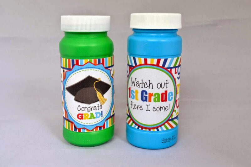 Two bottles of bubbles with graduation labels as an example of kindergarten graduation ideas