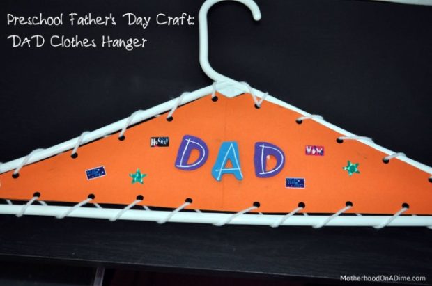 The best Father's Day crafts for kids can include everyday objects like this clothes hanger that has been decorated and says Dad on it.