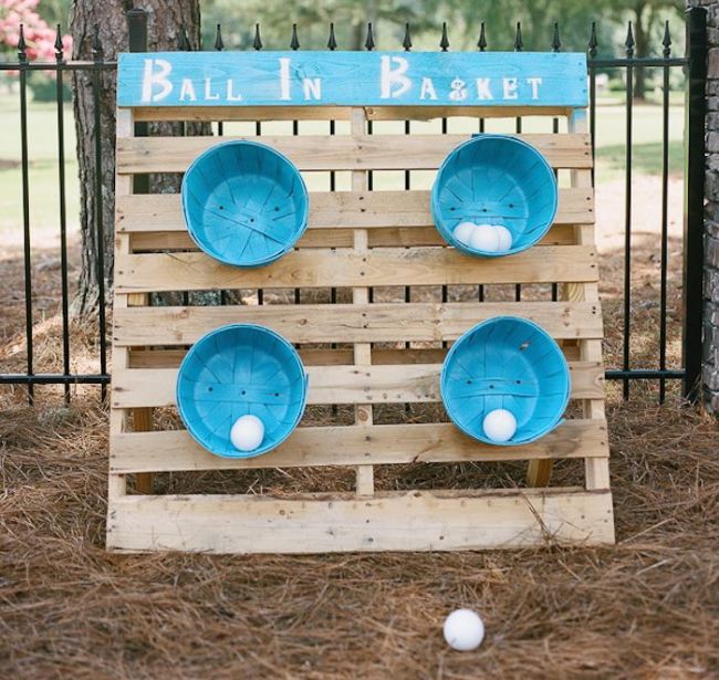 Blue bushel baskets mounted on an upright pallet, labelled Ball In Basket