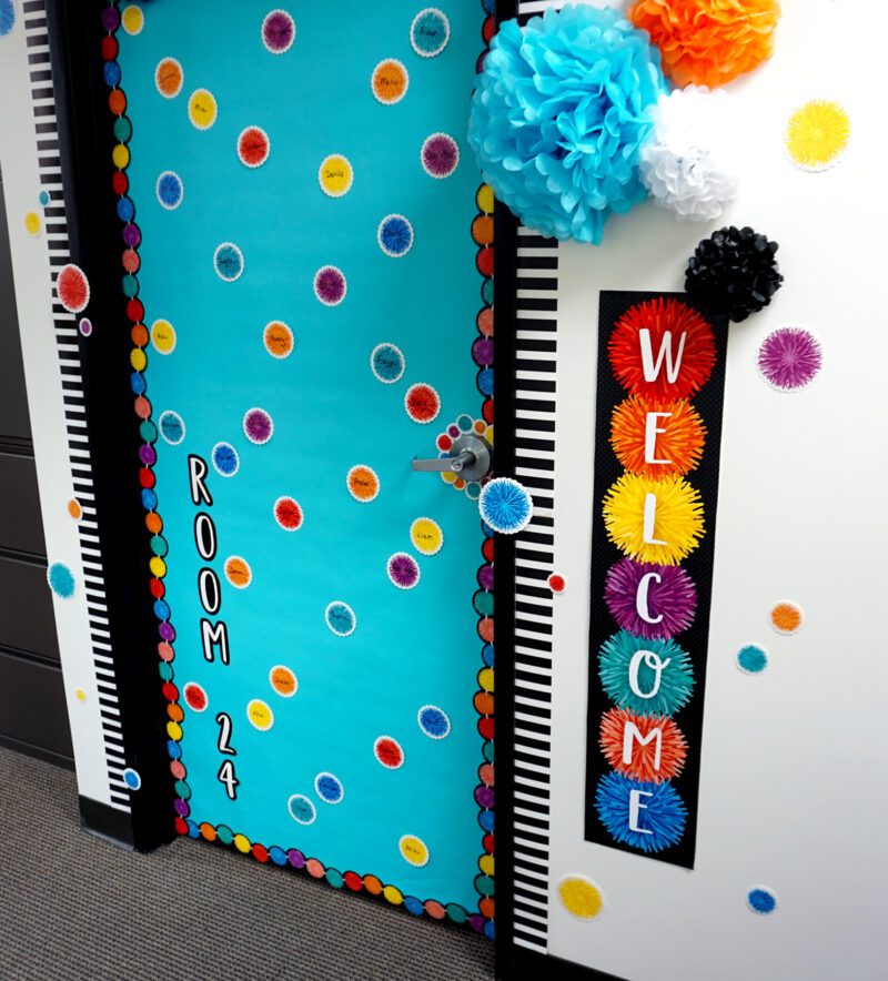 Classroom door with colorful pom-pom decor