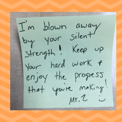 Teacher uses a sticky note to send daily affirmation to students.