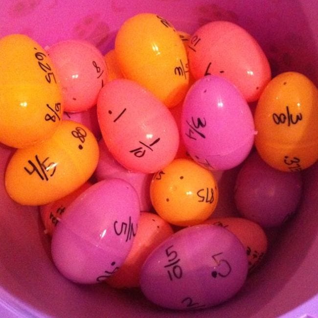 Plastic eggs with fractions written on one half and decimals on the other