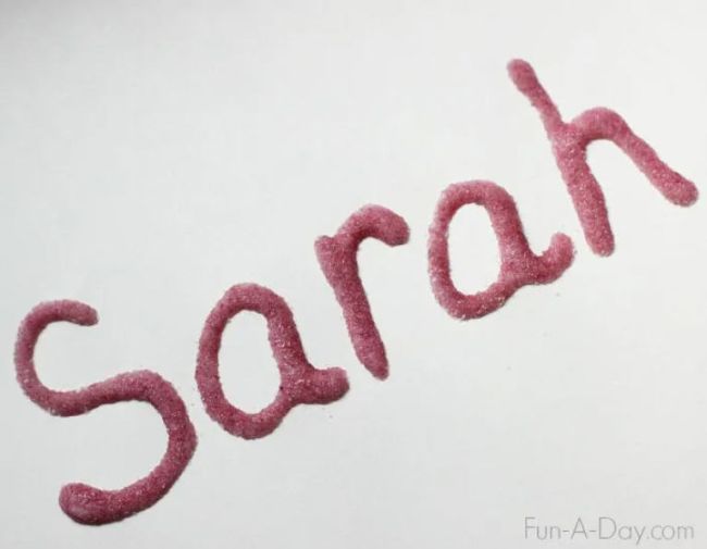 The name Sarah spelled out in textured letters
