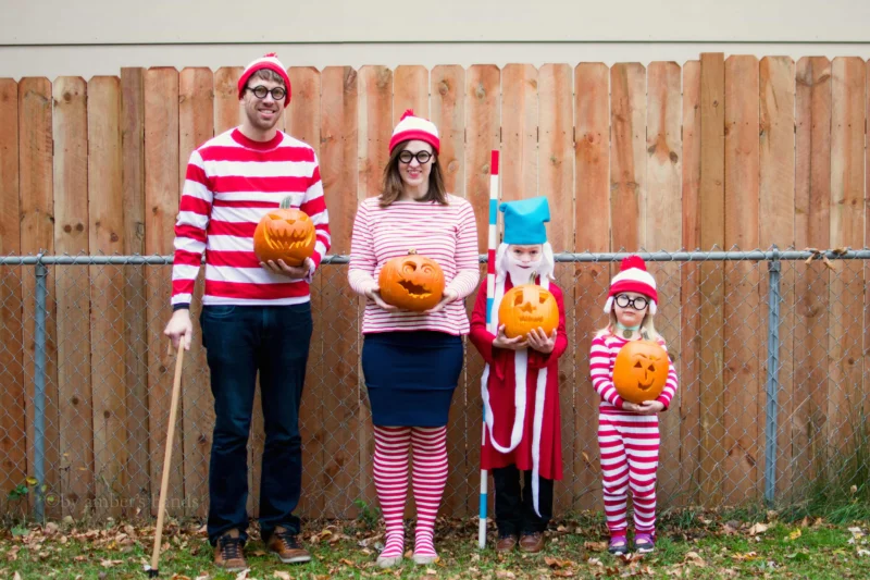 A family is shown dressed in red and white striped hats and shirts.