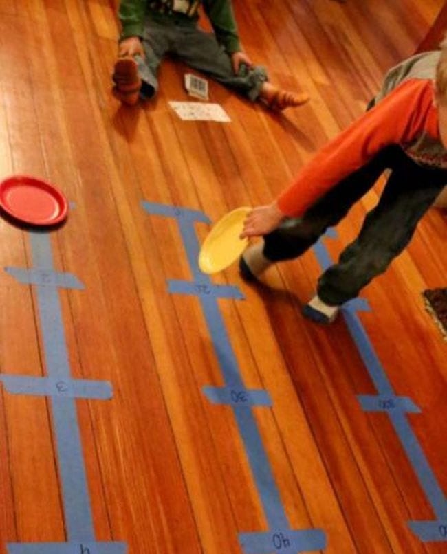 Giant number lines with kids walking on them.
