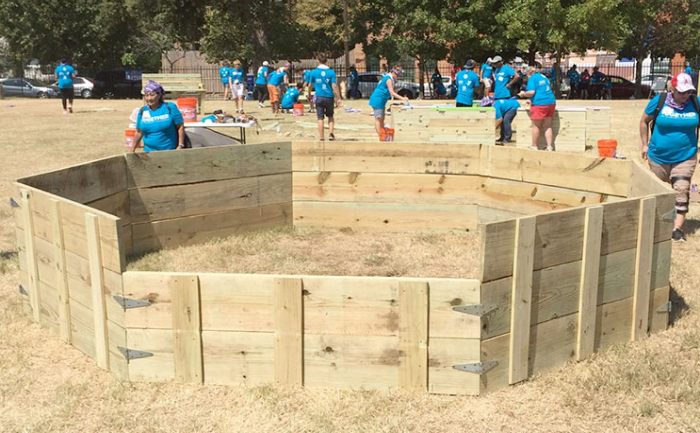 Wooden gaga ball pit built by volunteers