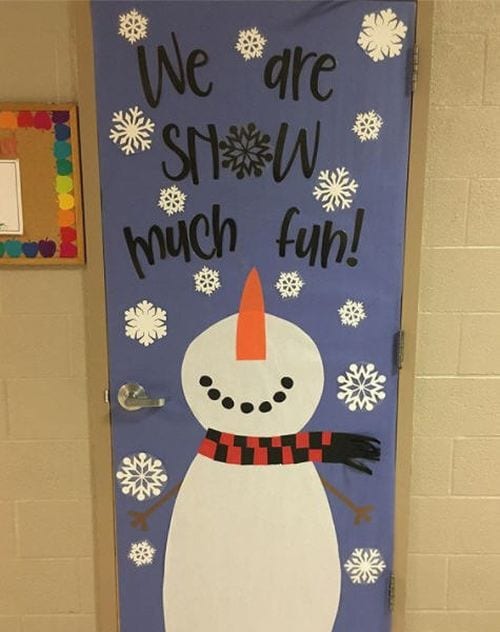 Holiday classroom doors include this one decorated with snowman looking up, with text reading We are Snow much fun