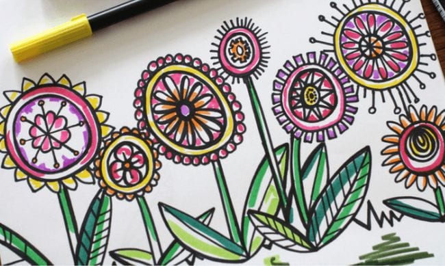 Abstract flowers outlined in black and colored with markers - Directed Drawing