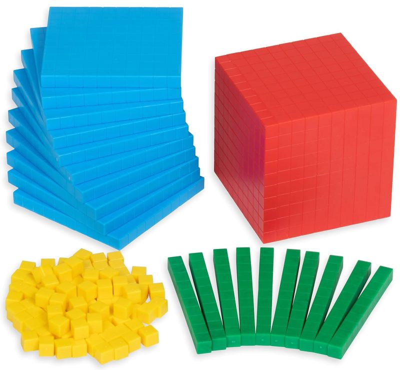 Base 10 blocks in blue, red, yellow, and green