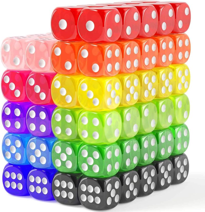 Stacks of colorful standard six-sided dice