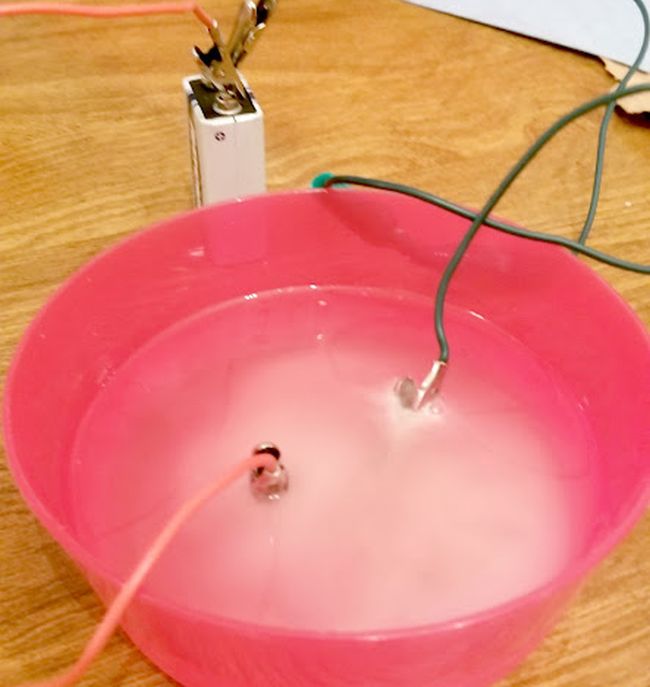 Tub of water with battery leads in it