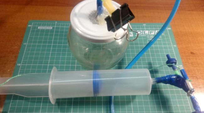 DIY vacuum chamber made from a jar and large hypodermic needle