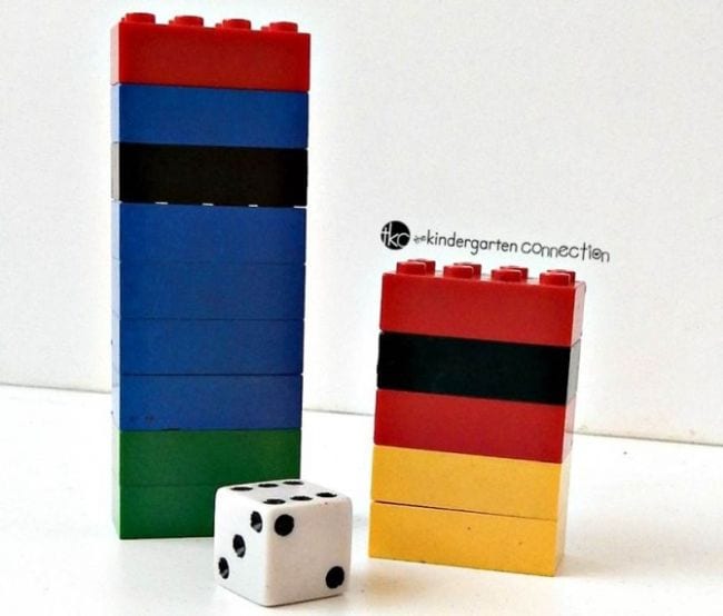 Two stacks of LEGOs behind a die