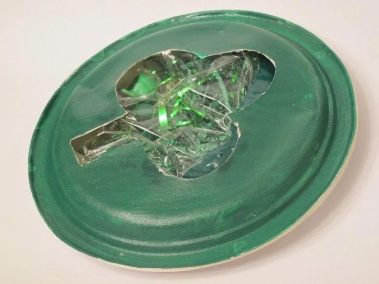 Shamrock shaker made out of paper plate, as an example of St. Patrick's Day activities 