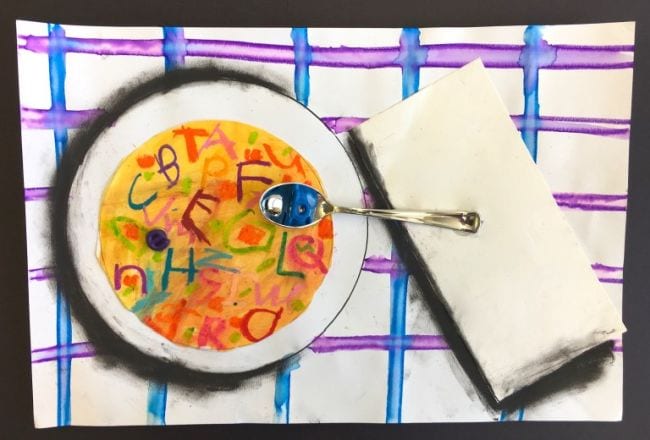Drawing of alphabet soup with a spoon mounted on top