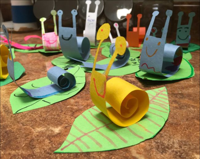 3-D construction paper snails are shown in this example of kindergarten art projects.