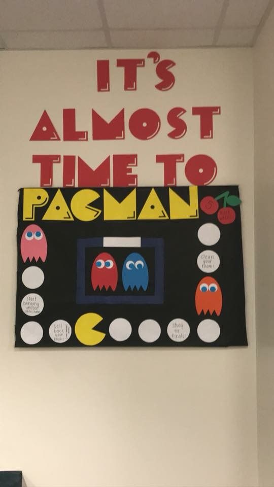 A bulletin board says Almost time to Pacman. It has the characters from the video game (summer bulletin board ideas)