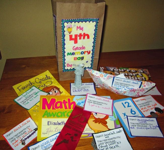 Paper bag labeled 4th Grade Memory Bag with an assortment of objects as an example of end of year assignments