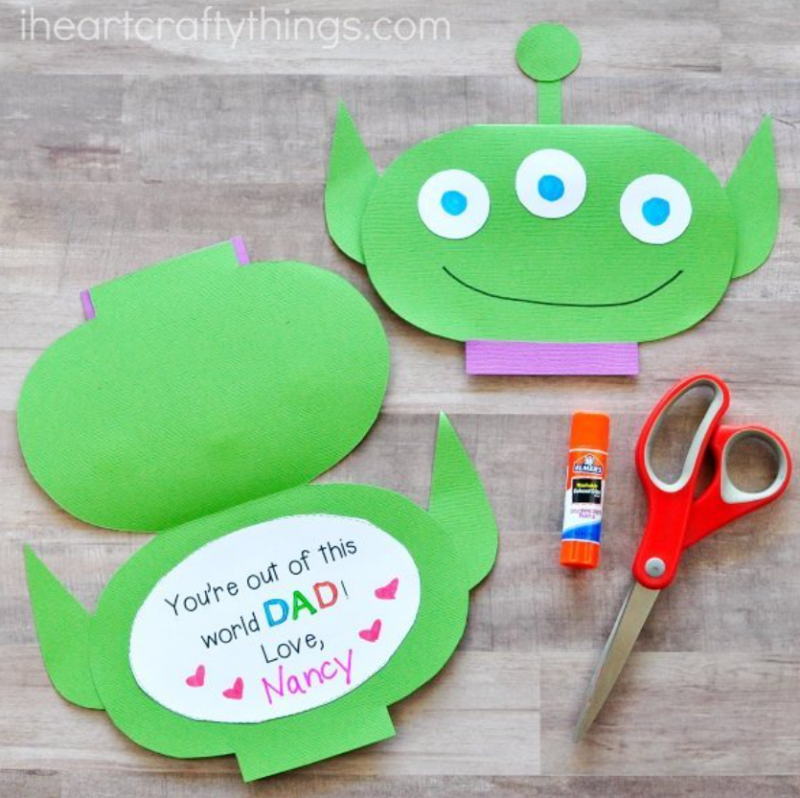 A little alien is made into a card out of construction paper in this example of Father's Day crafts for kids.