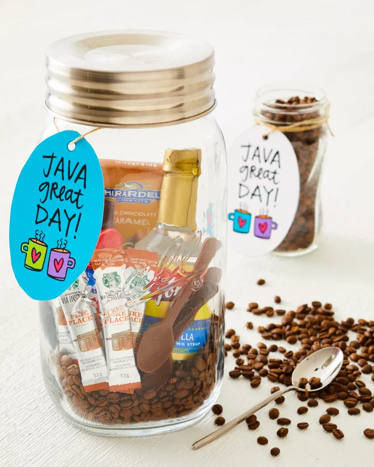 A glass jar has different coffee related items in it in this example of Father's Day Crafts for Kids.