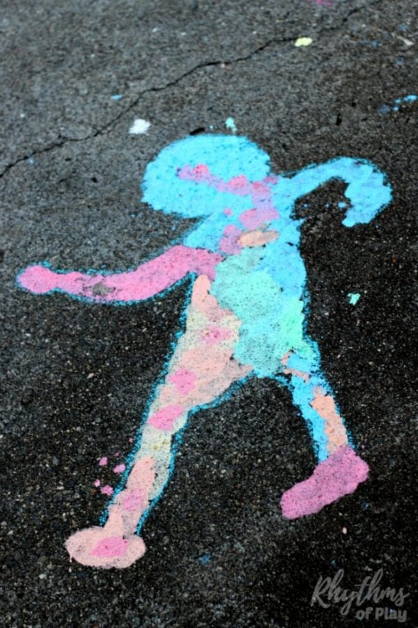 Child's shadow colored in with chalk paint
