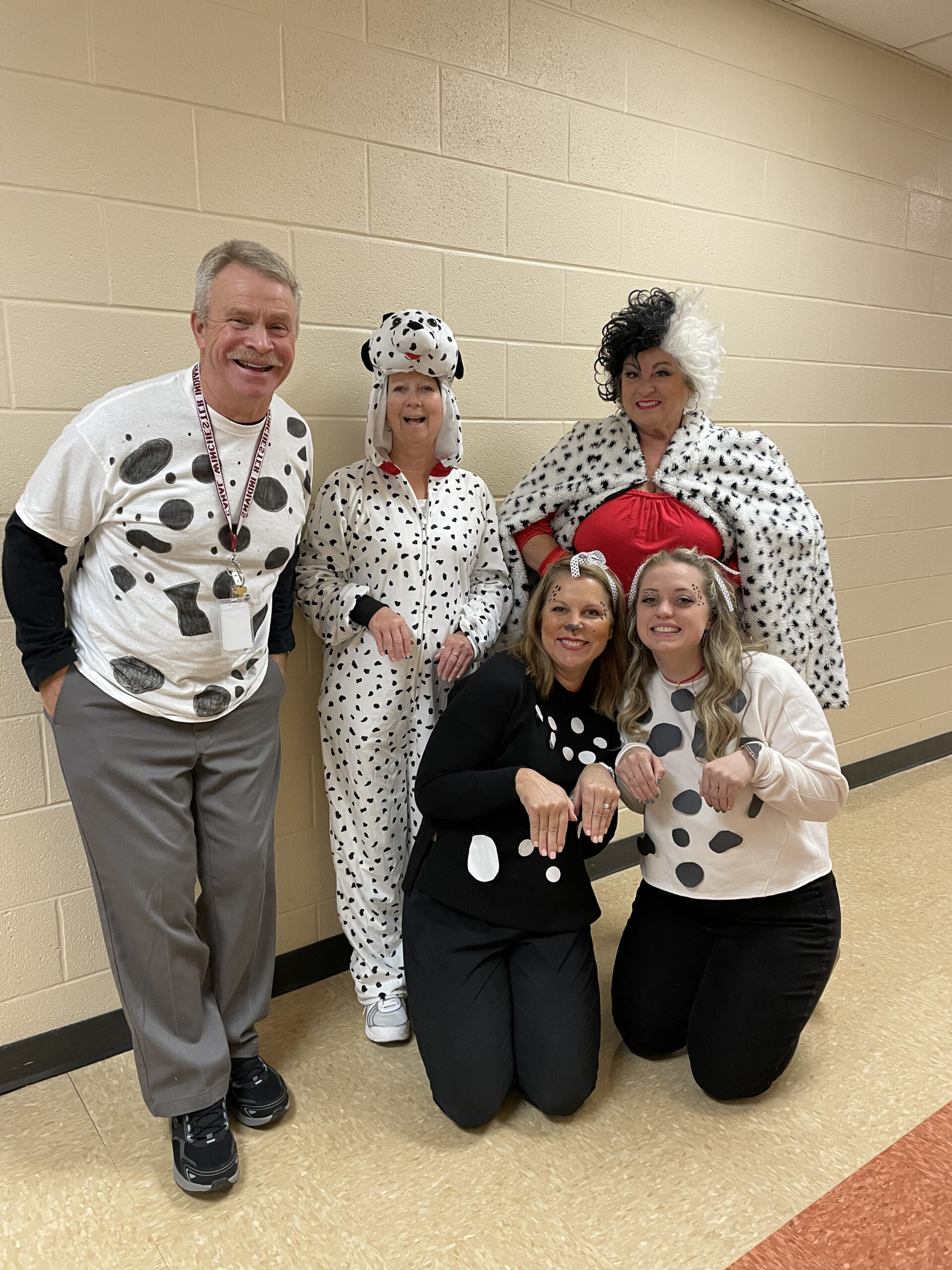 Teachers dressed as characters from 101 Dalmations