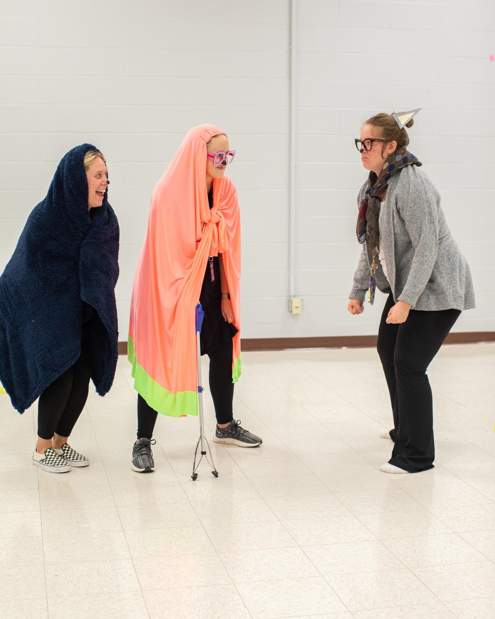 Teachers dressed as The Grannies from the TV show Bluey