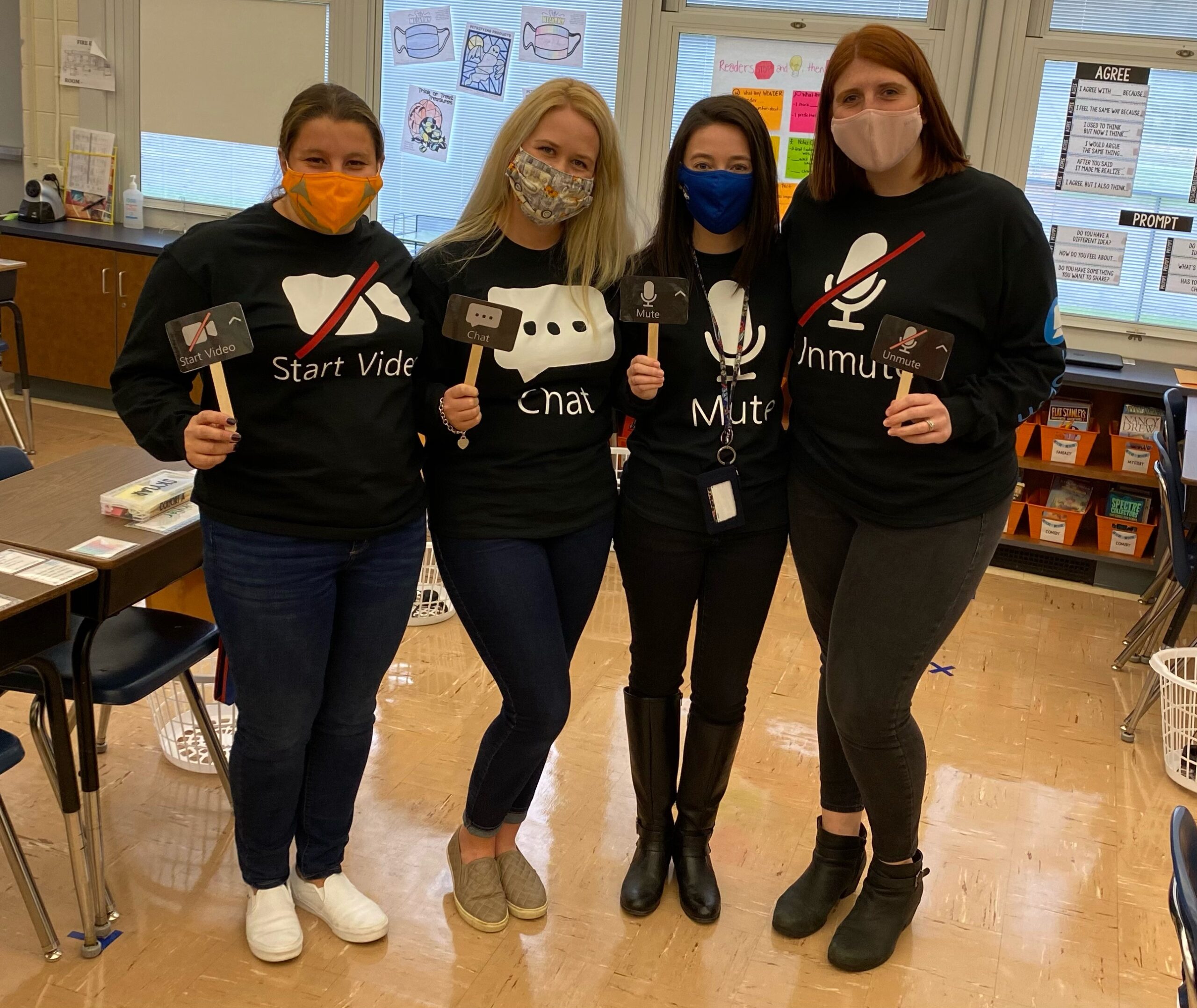 Teachers dressed as Zoom buttons for Halloween