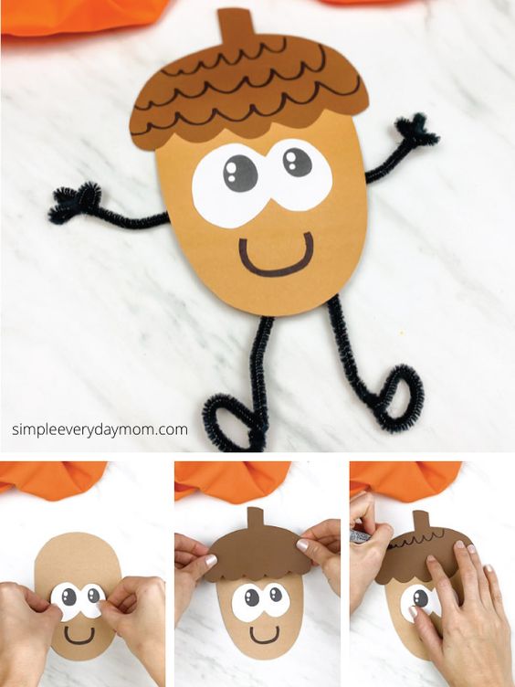 A cute Acorn made from cardstock and pipe cleaners has a smile, arms, and legs.