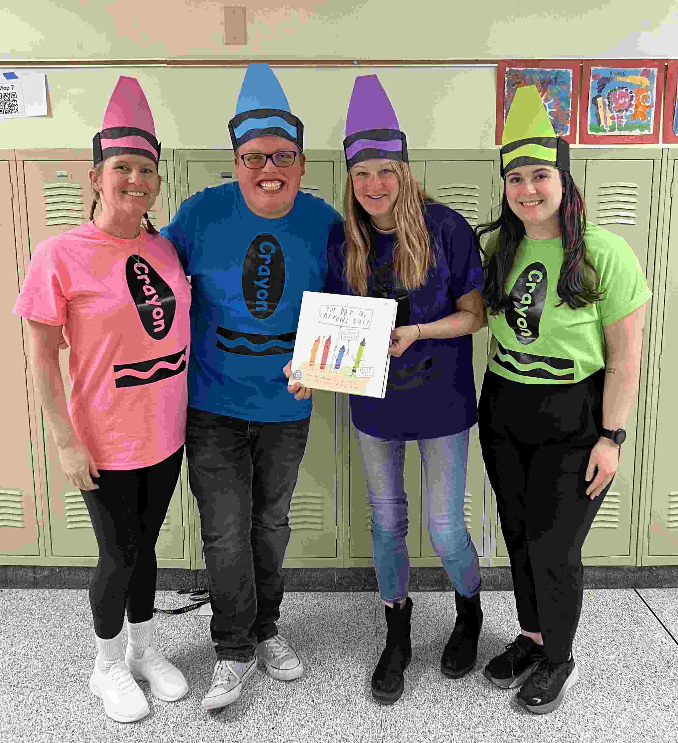 Teachers dressed as crayons from the book The Day the Crayons Quit